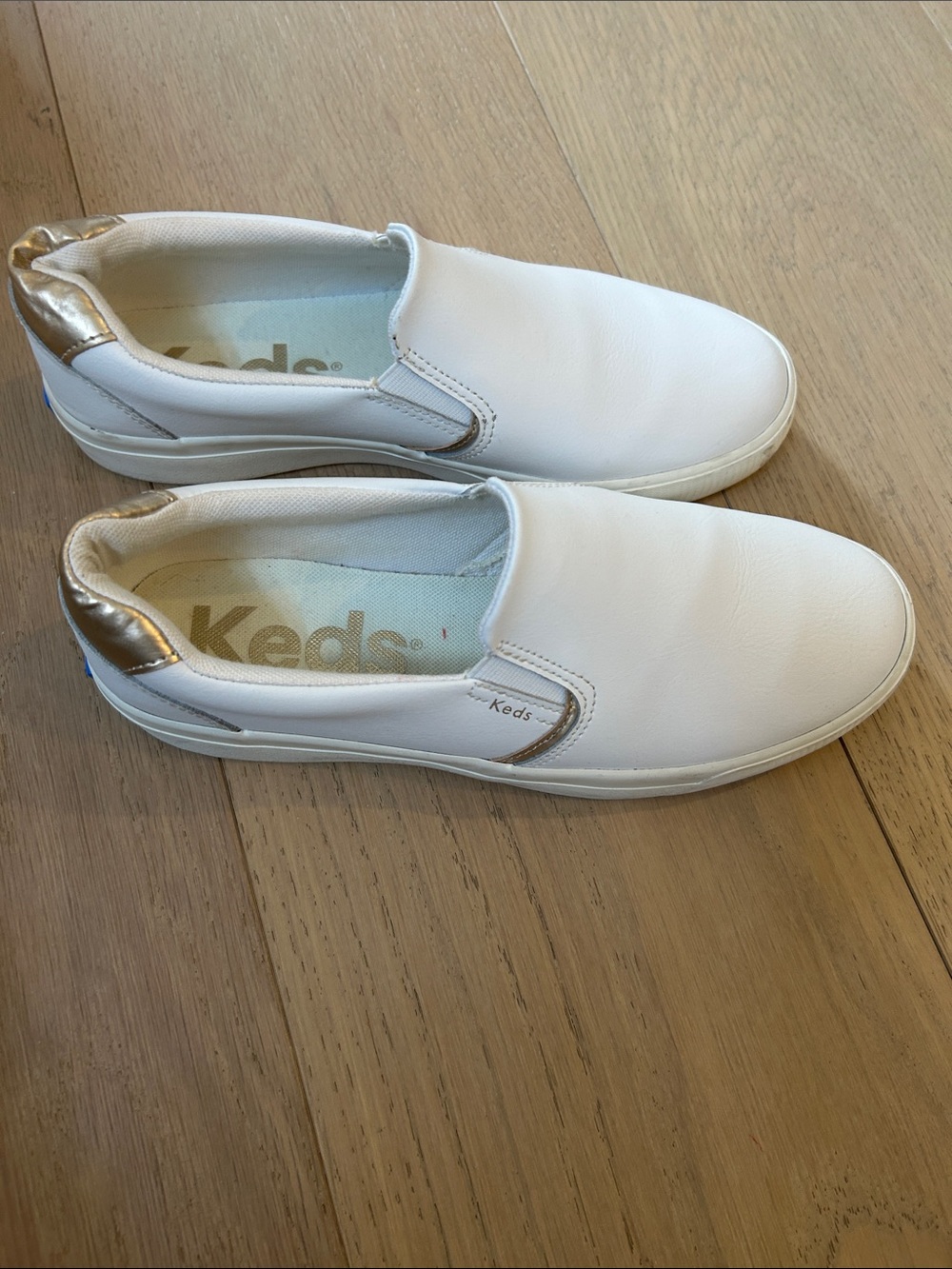 Keds White Slip-On Sneakers with Metallic Gold Heel
